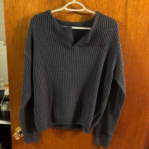 Woman’s Blue Sweater